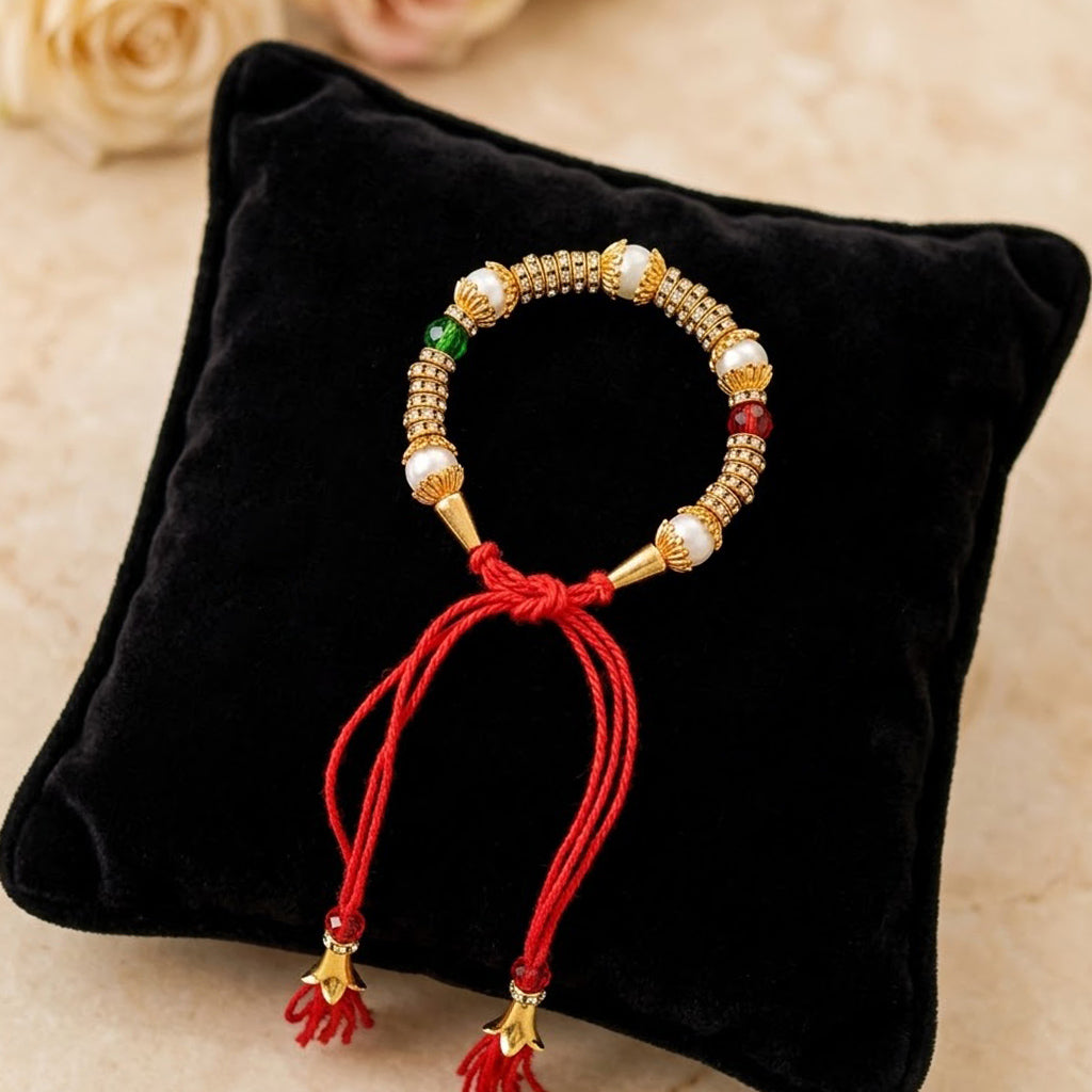 Handcrafted Traditional Pearl Gold Lumba Rakhi