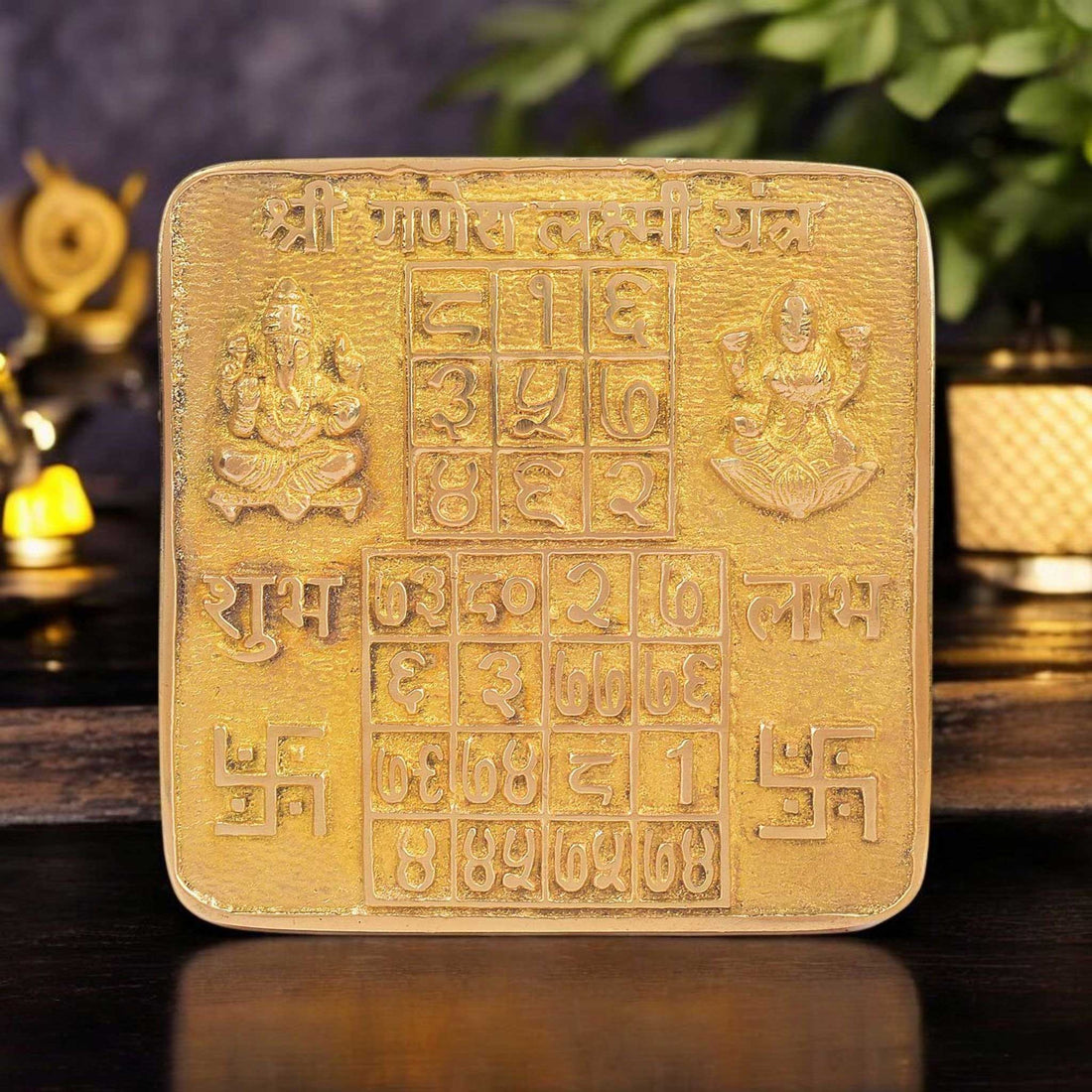 Asht Dhatu Shree Ganesh Laxmi Yantra intricately engraved with symbols of prosperity and obstacle removal—ideal for wealth attraction, business success, and spiritual balance. India’s Largest Pooja Accessories Brand - www.satvikstore.in