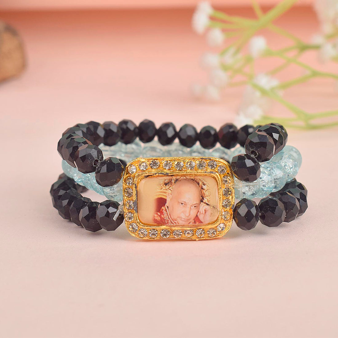 Black & Baby Blue Triple Layer Guruji Swaroop Bracelet featuring sleek black beads with soft baby blue middle layer and Jai Guruji Swaroop – perfect for spiritual wear, meditation, and gifting. India’s Largest Pooja Accessories Brand – www.satvikstore.in