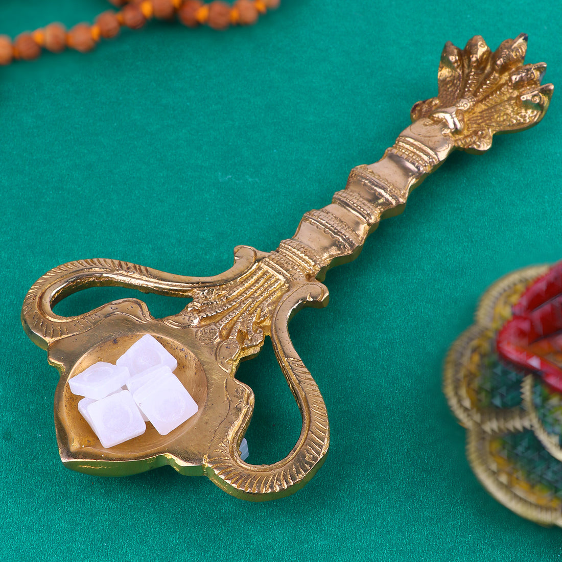Brass Pooja Aarti Sheshnaag Spoon, a beautifully designed brass spoon featuring the Sheshnaag (serpent) motif, used for performing aarti during pooja and spiritual rituals.
India’s Largest Pooja Accessories Brand – www.satvikstore.in