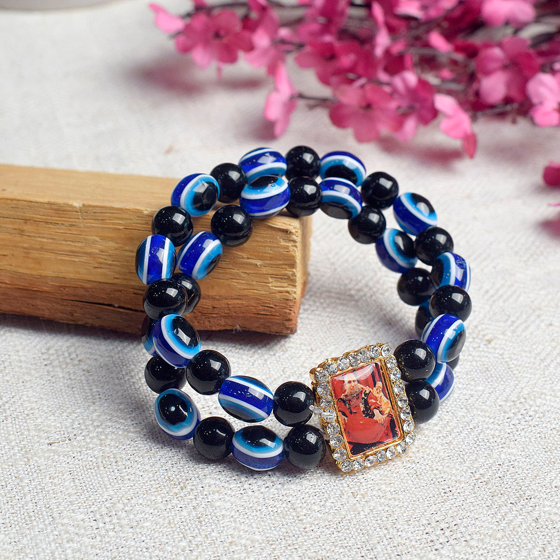 Black and Blue Evil Eye Round Pearl Bracelet with Jai Guruji Swaroop