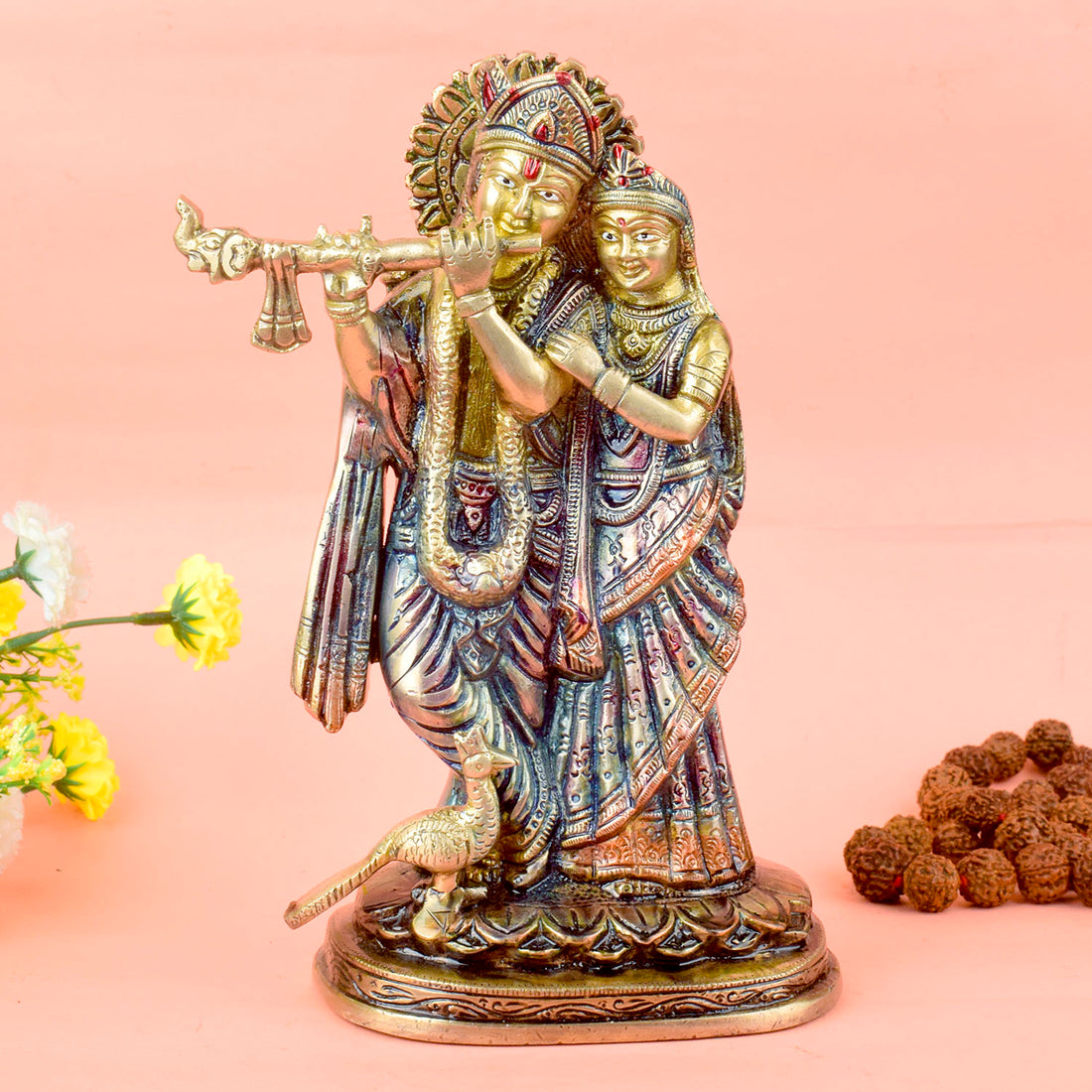 The 9 Inch Radha Krishna β Divine Presence in a Beautiful Idol is a stunning masterpiece that beautifully portrays the eternal love and devotion between Radha and Krishna. This intricately crafted idol captures the divine couple in an elegant and serene pose, with Krishna playing his enchanting flute and Radha radiating grace and love.