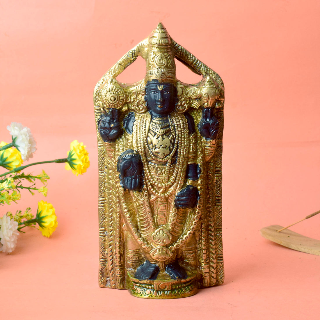 This 8-inch Tirupati Balaji statue beautifully captures the divine presence of Lord Venkateshwara, the beloved deity of the Tirupati temple. Crafted with exquisite attention to detail, the statue radiates grace, serenity, and spiritual blessings. Known for his power to bestow prosperity, health, and peace, Lord Balaji's idol brings a sense of calm and positive energy to any space.