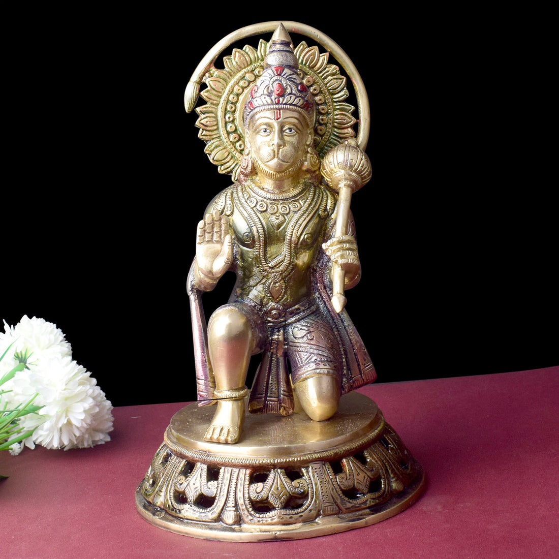 The "10.6 Inch Brass Hanuman Idol – Protector of Courage and Faith" is a stunningly detailed representation of Lord Hanuman, the embodiment of strength, devotion, and unwavering courage.
