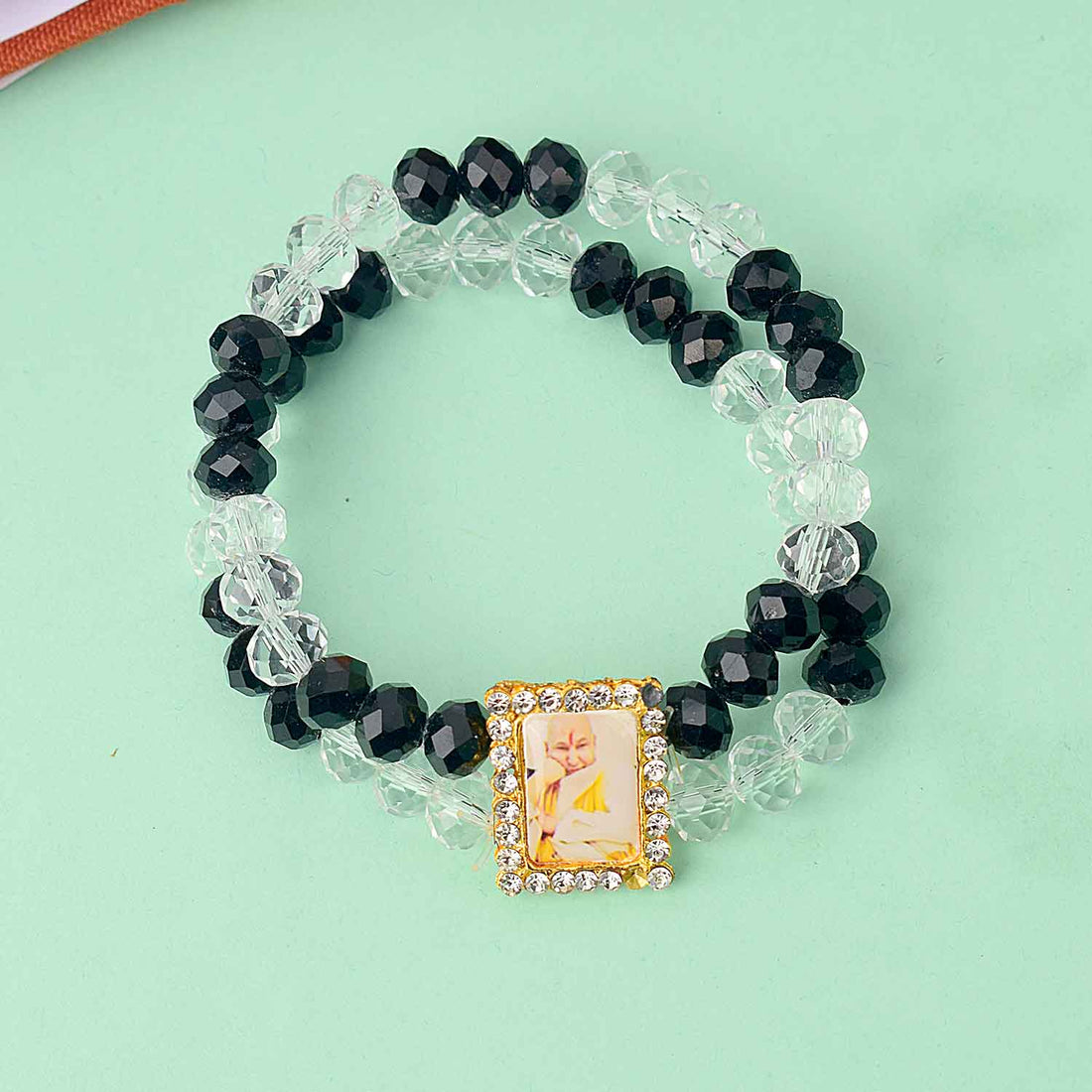 Guruji Swaroop Bracelet β Clear & Black Beads