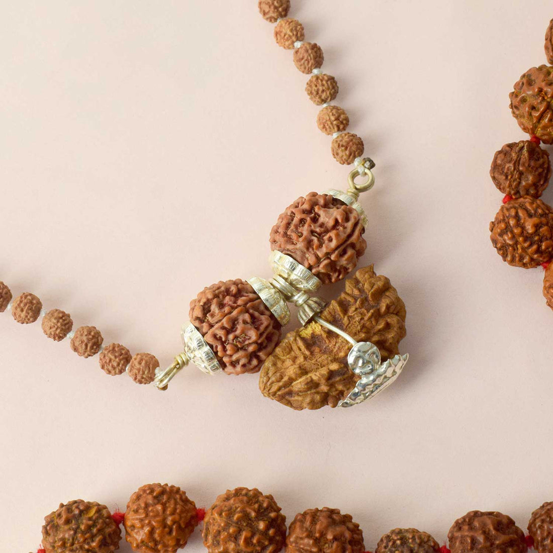 Certified 1, 6 & 7 Face Nepali Rudraksha Mala (Mukhi Kavach Silver Capping)