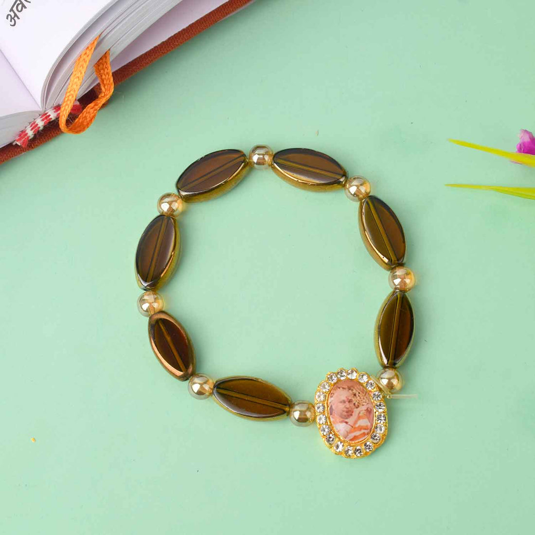 Guruji Swaroop Bracelet with translucent oval shaped beads in brown and black – ideal for spiritual daily wear and gifting. India’s Largest Pooja Accessories Brand – www.satvikstore.in