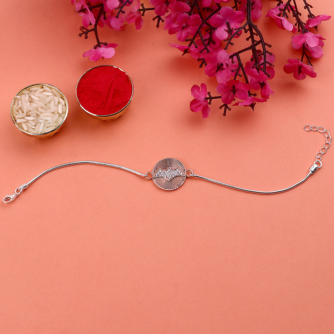 Enchanting Gleam: 925 Silver Rakhi for an Aristocratic Connection