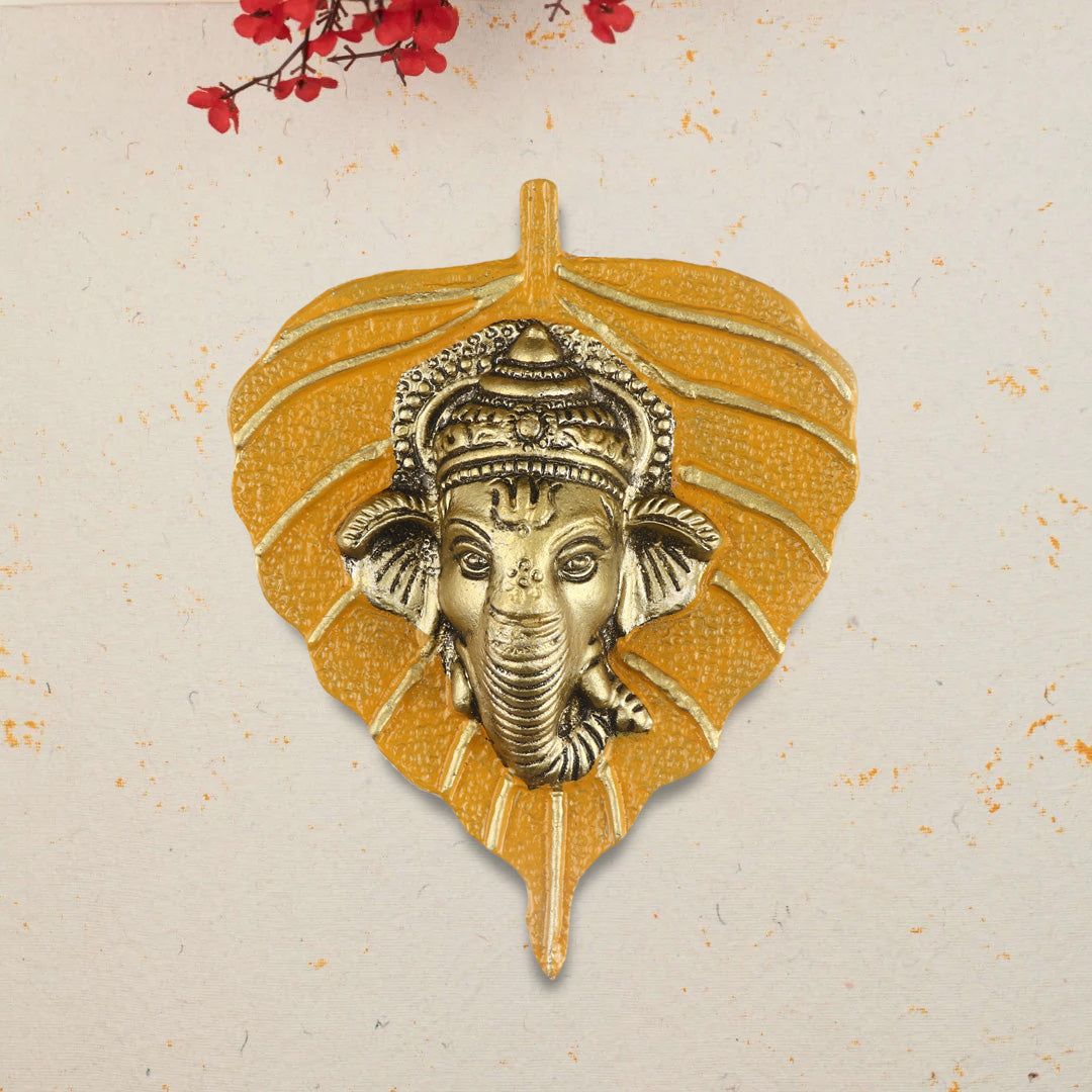 1 Pc Lord Ganesh Face on Leaf Patta Wall Hanging - Blue