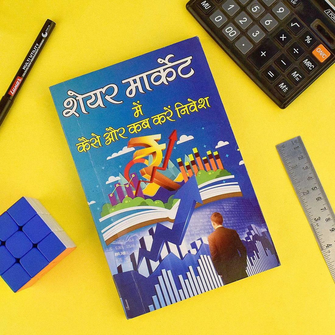 Cover image of "Share Market Book - Beginner to Expert Guide for Stock Market Investing" showing financial charts, bull-bear symbols, and stock trading elements. India’s Largest Pooja Accessories Brand – www.satvikstore.in