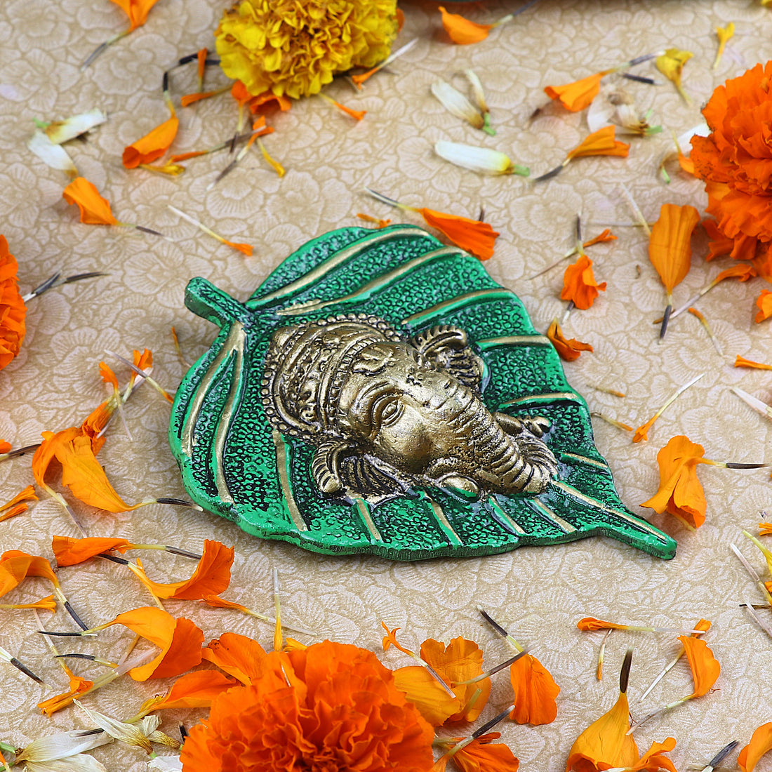 1 Pc Lord Ganesh Face on Leaf Patta Wall Hanging - Blue