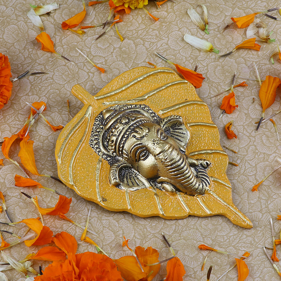 1 Pc Lord Ganesh Face on Leaf Patta Wall Hanging White