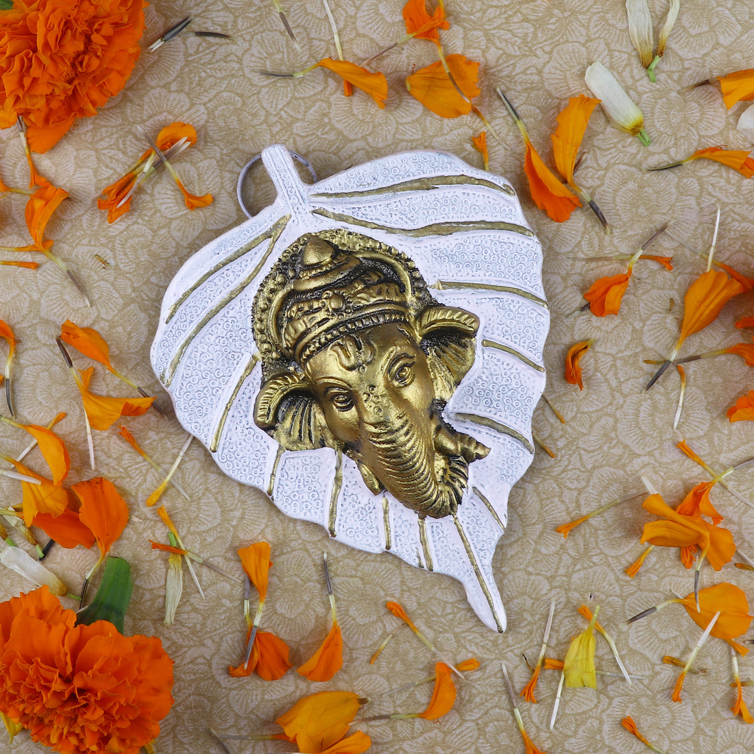1 Pc Lord Ganesh Face on Leaf Patta Wall Hanging - Blue