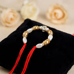 Gold and Pearl Crystal Stone Lumba Rakhi