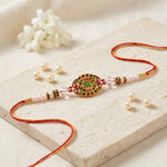 Vibrant Oval Gold Enamel Bro Centerpiece Designer Rakhi