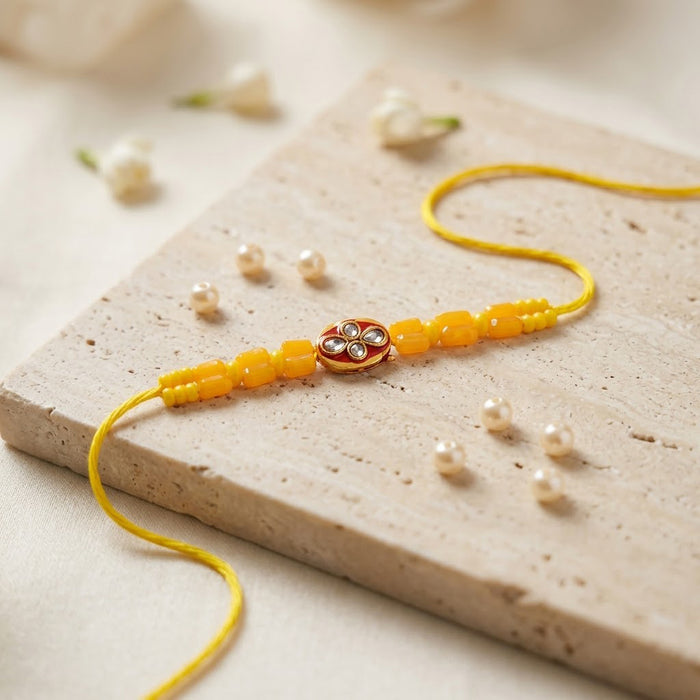 Elegant Floral Kundan Centerpiece Yellow Designer Rakhi