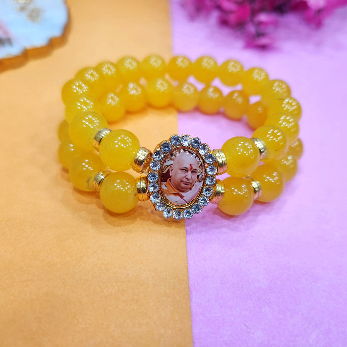 Yellow Round Pearl Bracelet with Jai Guruji Swaroop