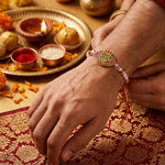 Vibrant Oval Gold Enamel Bro Centerpiece Designer Rakhi