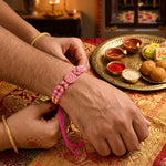 Traditional Devotional Pink Om Centerpiece Stone Encrusted Rakhi