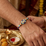 Handcrafted Floral Blue Meenakari and Beaded Rakhi