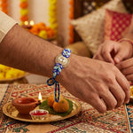 Premium Solitaire Gem and Leaf Embellished Designer Rakhi