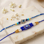 Modern Protection Hamsa Hand and Blue Evil Eye Rakhi (Set of 2)