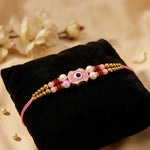Pretty Pink Enamel Medallion Double Strand Beaded Rakhi