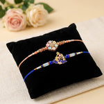 Handcrafted Pastel Floral Divine Peacock Rakhi (Set of 2)