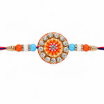 Circular Crystal Encrusted Floral Emblem Orange Accent Rakhi