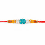 Handcrafted Turquoise Carved Om Symbol Flower Motif Rakhi