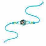 Divine Radha Krishna Emblem Pearl Accent Sky Blue Rakhi