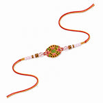 Vibrant Oval Gold Enamel Bro Centerpiece Designer Rakhi