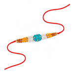 Handcrafted Turquoise Carved Om Symbol Flower Motif Rakhi