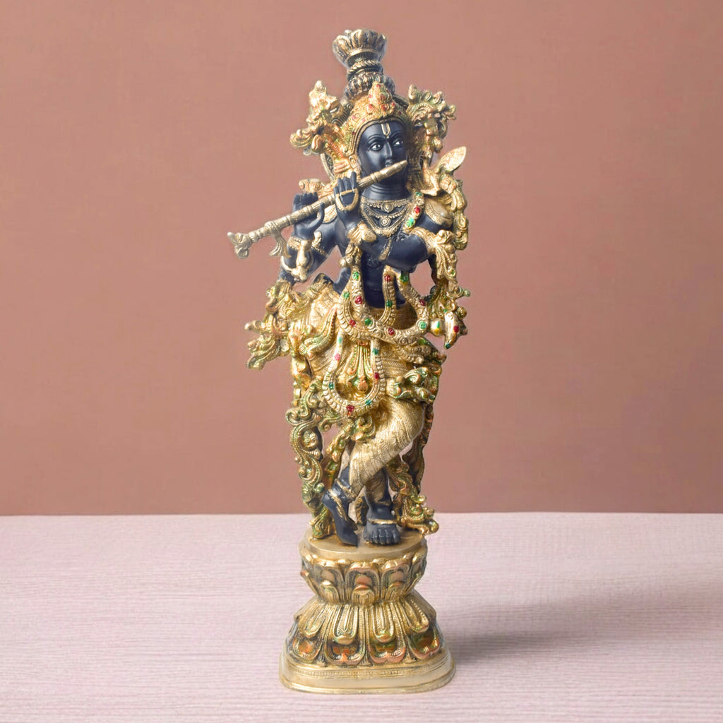  Elevate your space with the majestic 28-inch Brass Krishna Sculpture, designed with exquisite artistic detailing. This grand piece beautifully depicts Lord Krishna in a graceful and serene posture, showcasing intricate craftsmanship that highlights every delicate feature. 