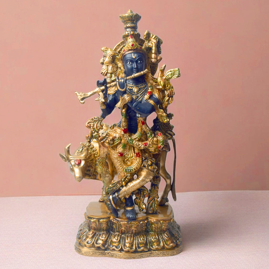 Enhance your space with the divine presence of this 17-inch Brass Krishna Statue with Cow. This beautifully crafted sculpture features Lord Krishna in a serene pose, accompanied by a cow, symbolizing the deep connection between the divine and nature.