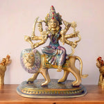  Embrace the powerful energy of Maa Durga with this 8.5-inch Brass 8-Armed Durga Idol, beautifully depicted riding her mighty lion. This meticulously crafted statue showcases Maa Durga in her most majestic form, symbolizing strength, courage, and divine protection. 