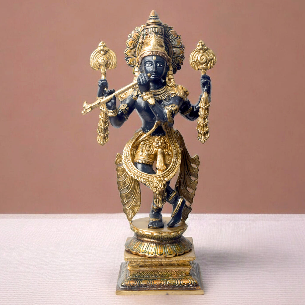 Bring home the divine charm of Lord Krishna with this exquisite 19-inch Brass Chola Krishna Sculpture. Expertly crafted, this statue captures Lord Krishna in his iconic pose, gracefully playing the flute.