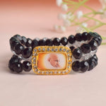 Black & Grey Triple Layer Guruji Swaroop Bracelet featuring sleek black beads with a sophisticated grey middle layer and Jai Guruji Swaroop – perfect for spiritual wear, meditation, and gifting. India’s Largest Pooja Accessories Brand – www.satvikstore.in