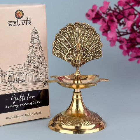 Handcrafted Brass Flying Peacock Kerala Samai Deepam Puja Diya – Exquisite brass diya in the shape of a flying peacock, designed for traditional Kerala-style rituals and pooja ceremonies. India’s Largest Pooja Accessories Brand – www.satvikstore.in