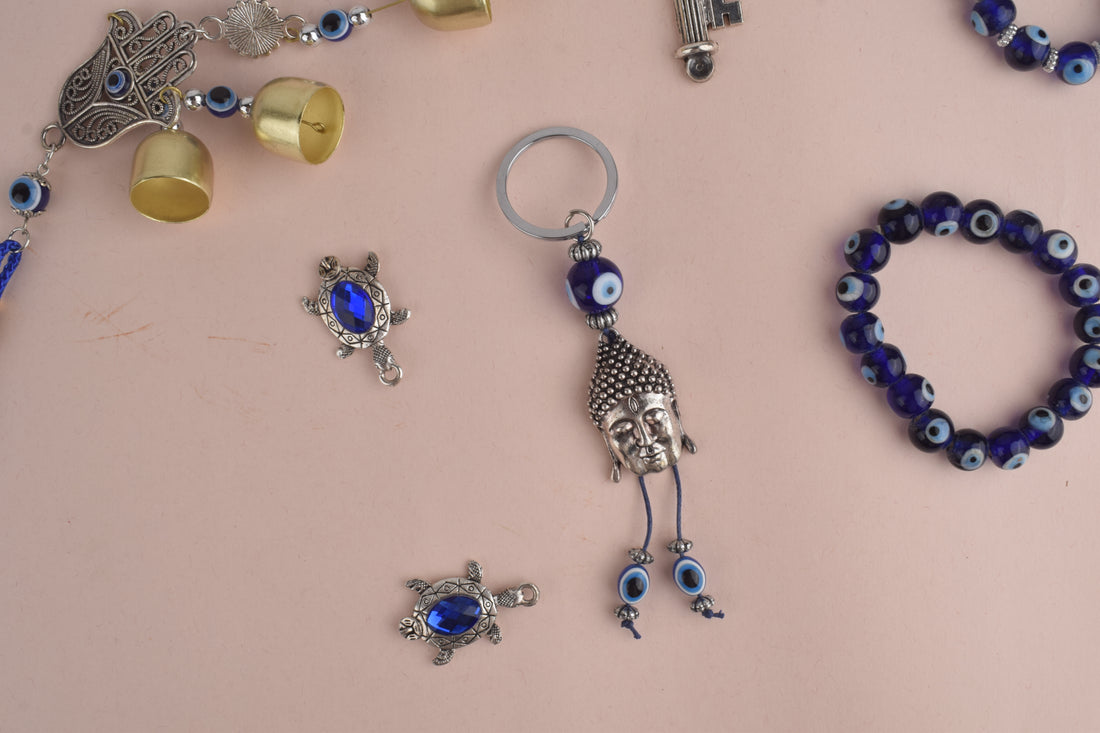 Alluring Silver Plated Buddha Keychain with Evil Eye