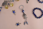Alluring Silver Plated Buddha Keychain with Evil Eye