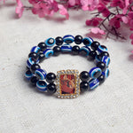 Black and Blue Evil Eye Round Pearl Bracelet with Jai Guruji Swaroop
