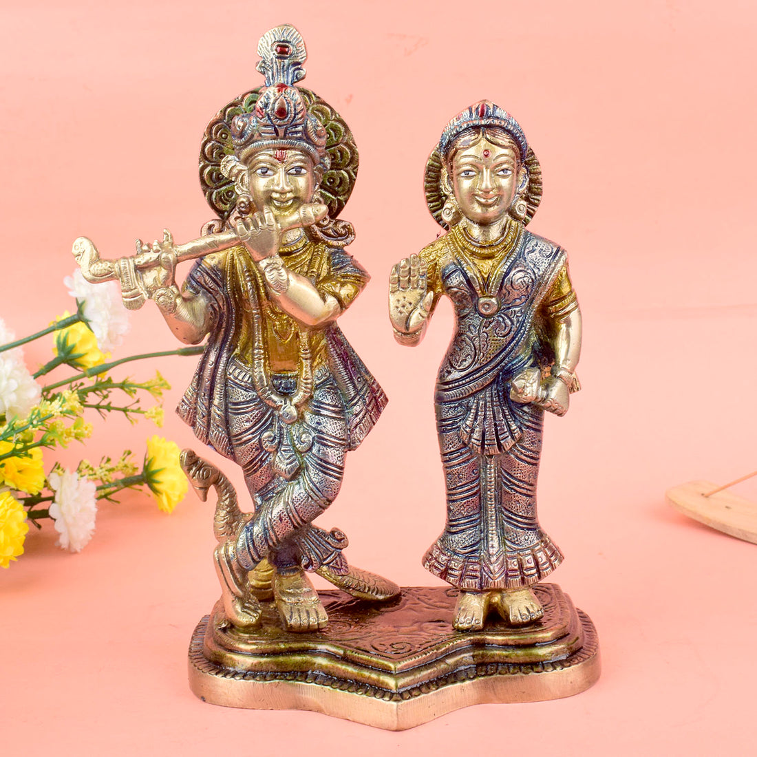 The 8 Inch Radha Krishna Idol – A Symbol of True Devotion and Love is a magnificent representation of the eternal bond between Radha and Krishna, capturing the purity and depth of their divine love. This beautifully crafted idol depicts Krishna playing his flute, while Radha stands beside him, radiating grace, love, and devotion.