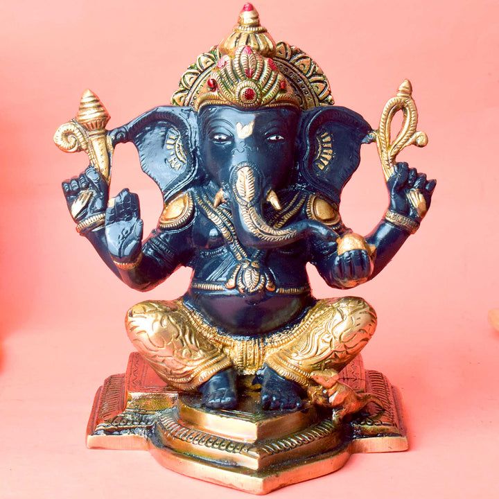 The "9.1 Inch Sacred Ganesh Idol" is a beautifully crafted statue of Lord Ganesha, symbolizing wisdom, success, and the removal of obstacles. Standing at 9.1 inches tall, it features intricate detailing and traditional attributes like the axe, lotus, and modak.