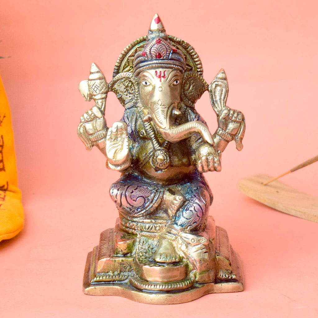  The "5.1 Inch Divine Ganesh Idol" is a beautifully crafted statue symbolizing wisdom, prosperity, and the removal of obstacles. Standing at 5.1 inches tall, this idol captures the serene and auspicious presence of Lord Ganesha, the beloved Hindu deity known for bringing good fortune and success. 