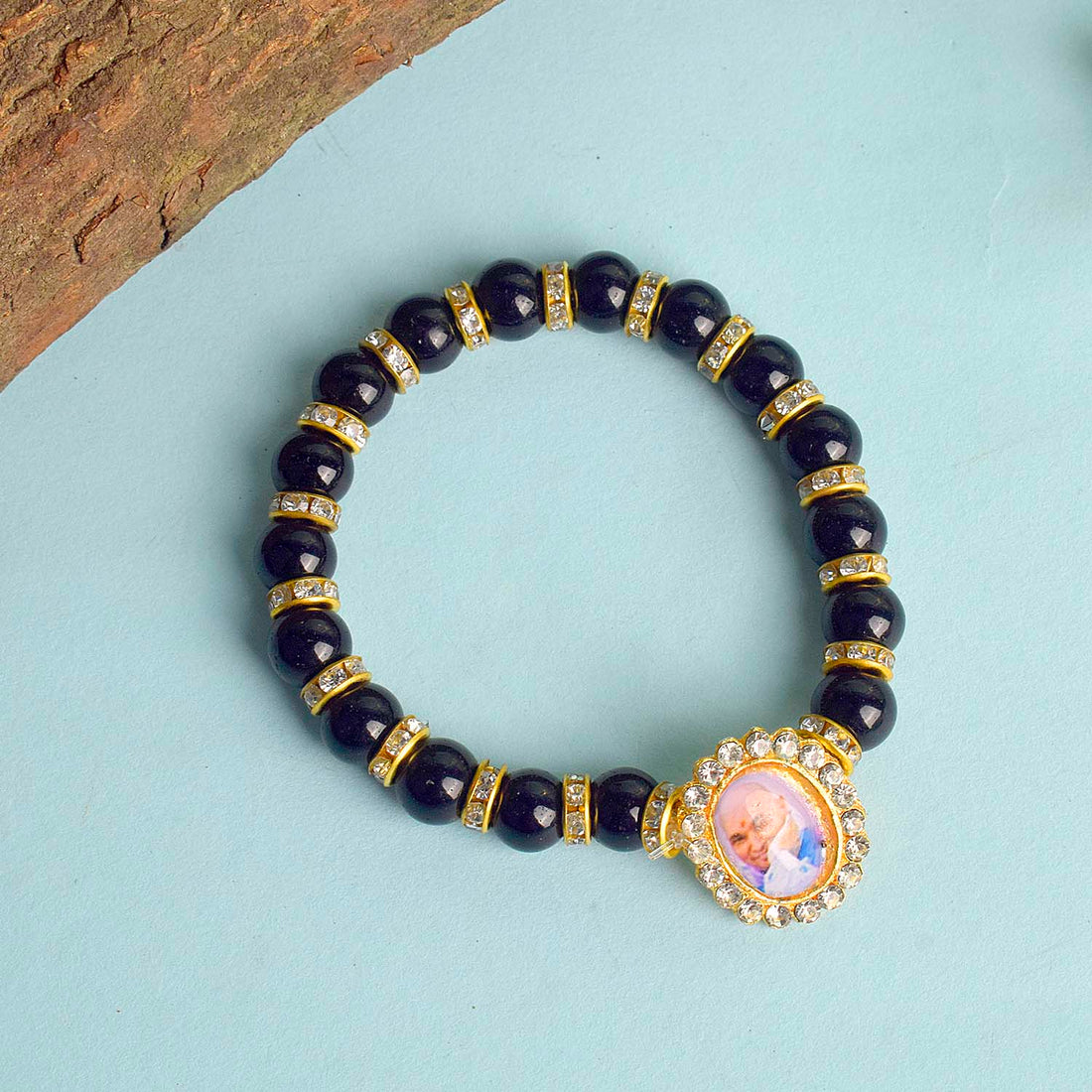 Black Shiny Beads with Golden Studs Single Layer Guruji Swaroop Bracelet