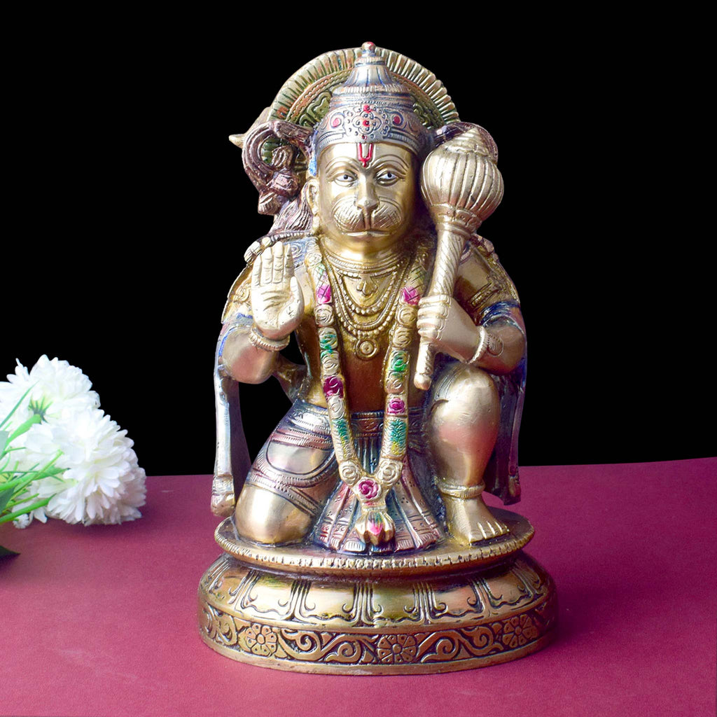 The "10.6 Inch Brass Hanuman Idol – Protector of Courage and Faith" is a stunningly detailed representation of Lord Hanuman, the embodiment of strength, devotion, and unwavering courage.