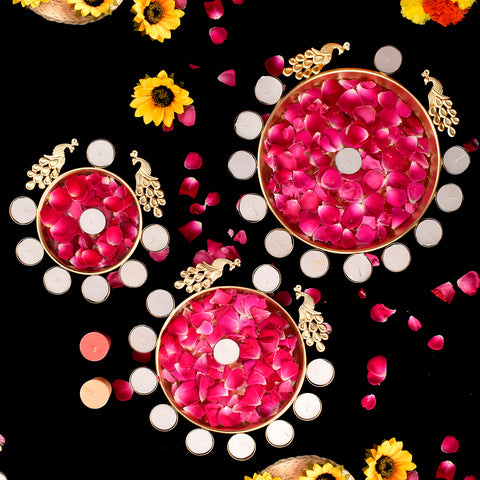 Decorative Metal Peacock Flower Urli with Tea Light (Pack of 3) – Set of three intricately designed metal urli featuring peacock flower motifs, each with a tea light holder for elegant decor. India’s Largest Pooja Accessories Brand – www.satvikstore.in