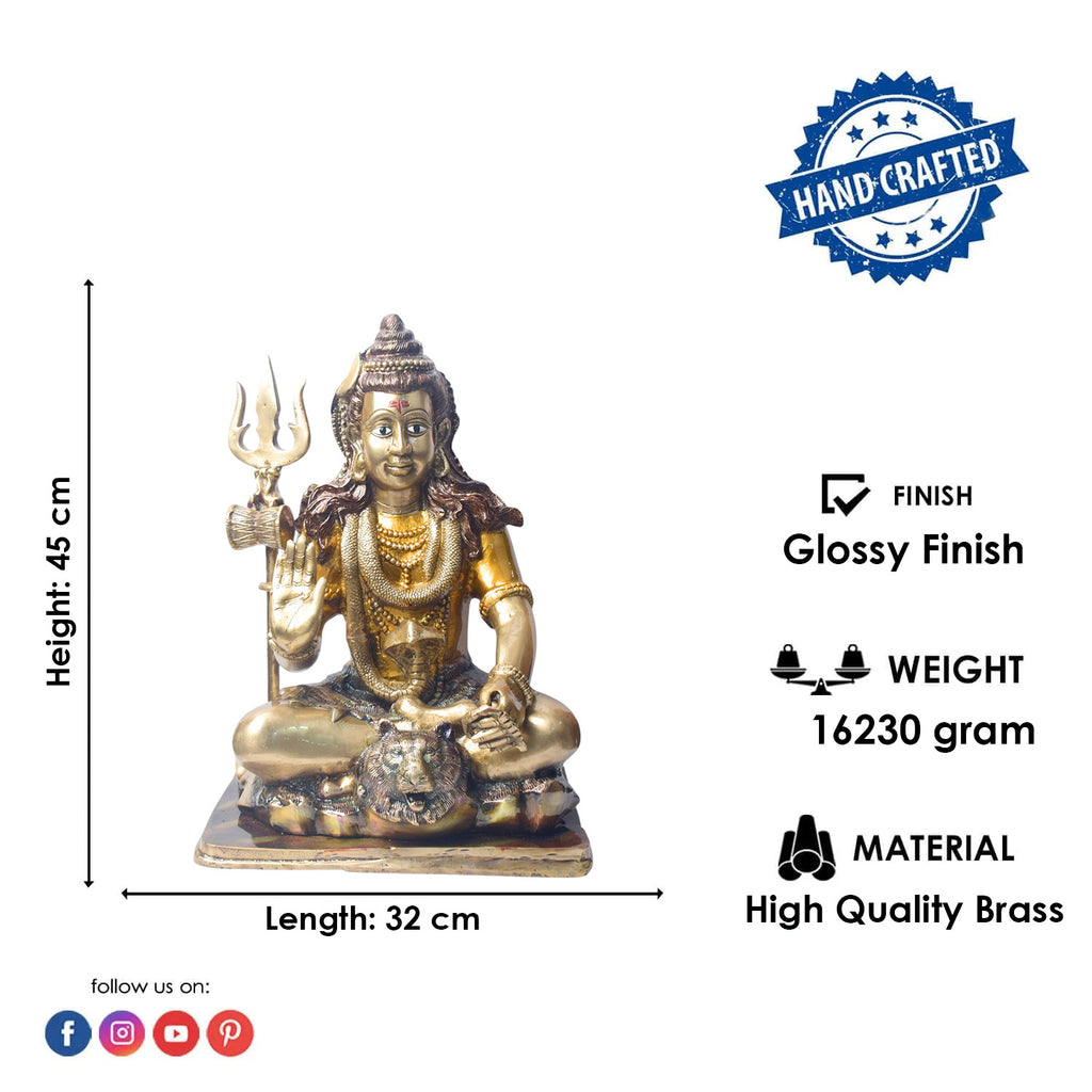 Embodying peace and spiritual focus, this 17.5-inch Brass Shiva Idol features Lord Shiva in a serene meditative posture. Known as the ultimate yogi, Lord Shiva is beautifully represented here with intricate detailing in brass, capturing the tranquility and profound wisdom of his meditation.