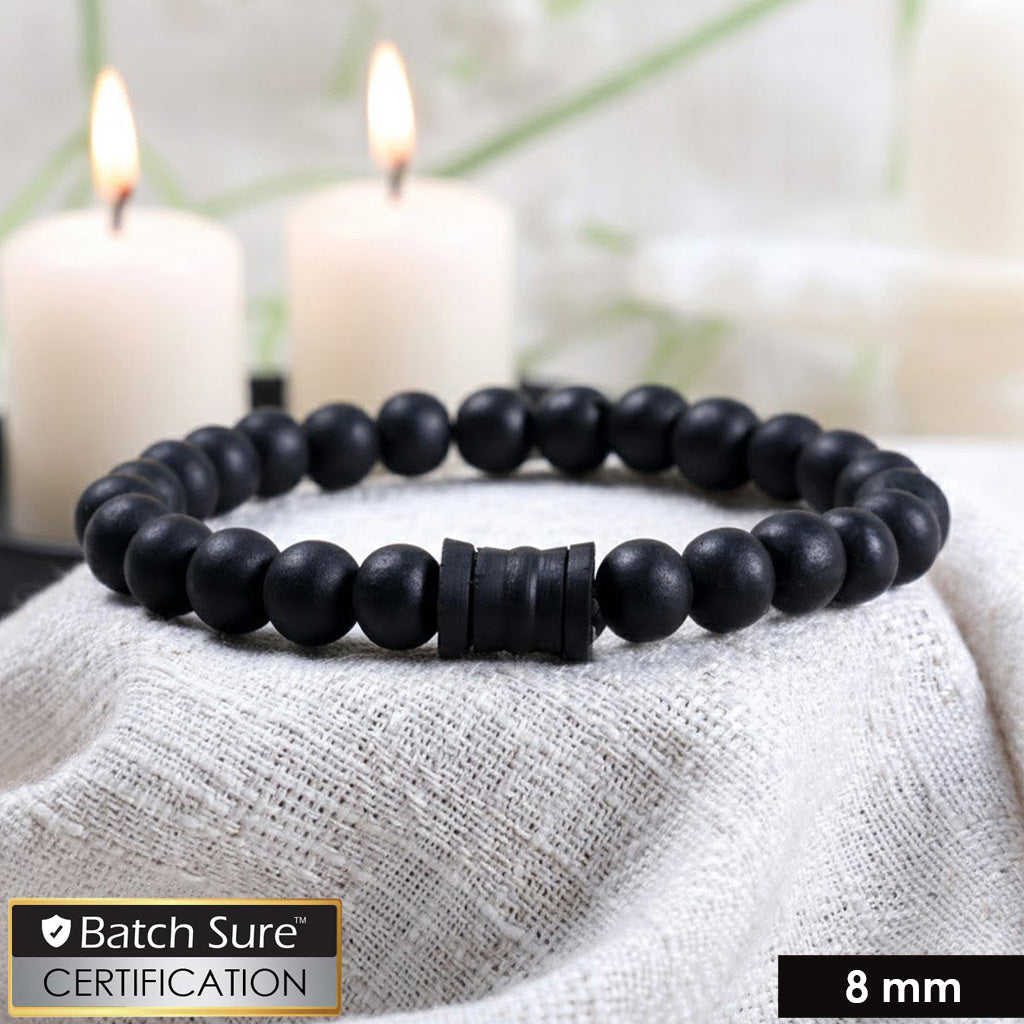 8mm black karungali bead bracelet with a central damru-shaped bead on an elastic cord, shown on a plain background. India’s Largest Puja Accessories Brand- www.satvikstore.in